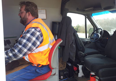 PipeCheck operator inside a Rausch inspection vehicle